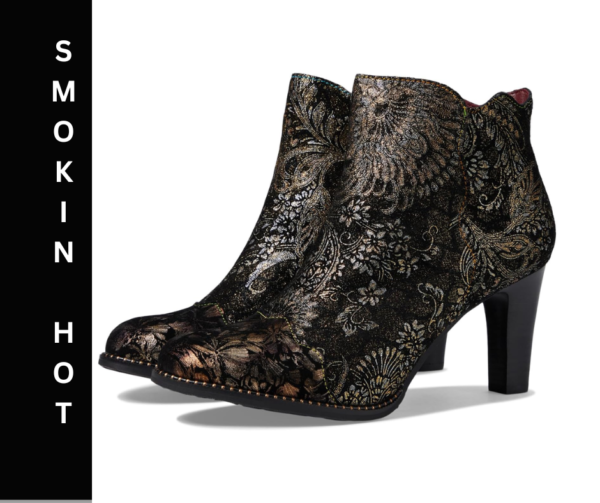 A pair of black and gold boots with floral design.