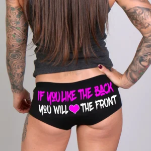 A woman with tattoos on her arms and back.
