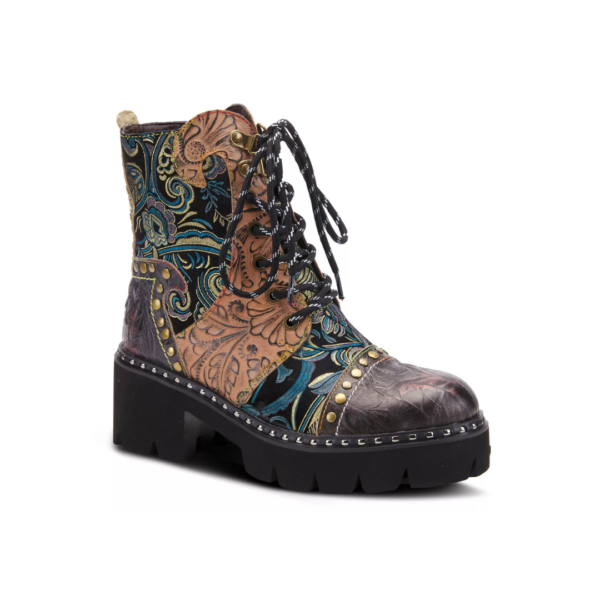 A pair of boots with a floral pattern and black sole.