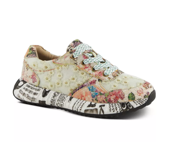 A pair of shoes with flowers and pearls on them.
