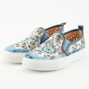 A pair of blue shoes with white soles.
