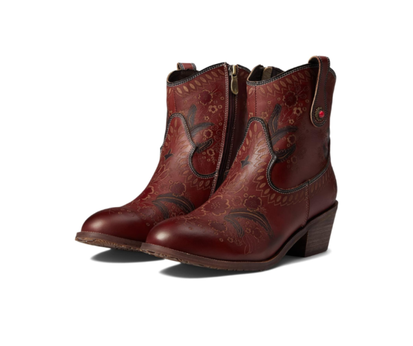 A pair of red boots with black designs on them.