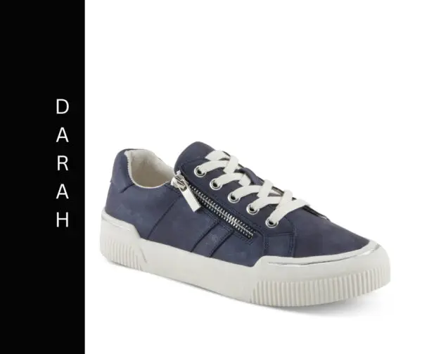 A pair of shoes with laces and zippers.
