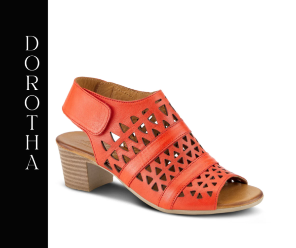 A red sandal with cut outs on the side of it.