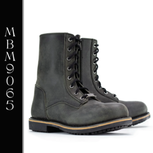 A pair of boots that are on the ground