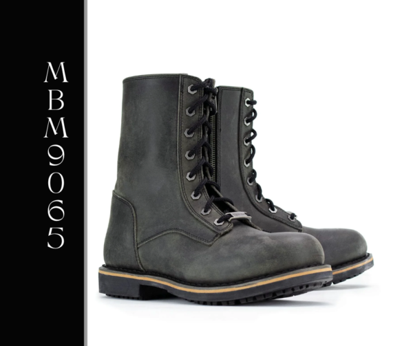 A pair of boots that are on the ground