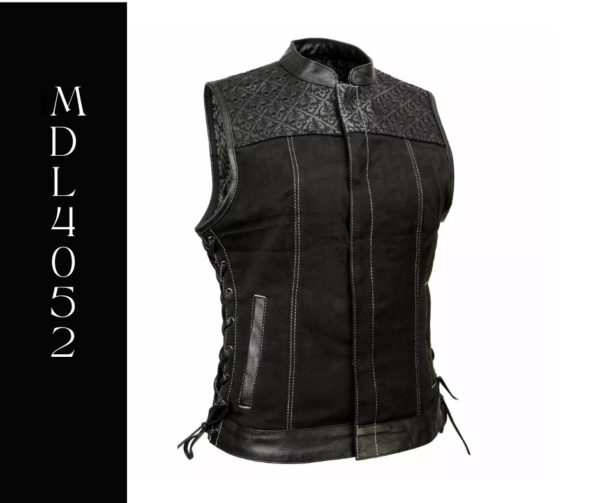 A black vest with leather on the front and back.