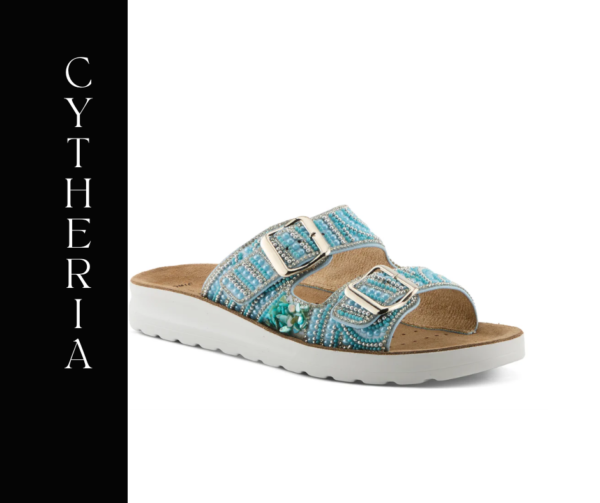 A pair of blue sandals with white soles.