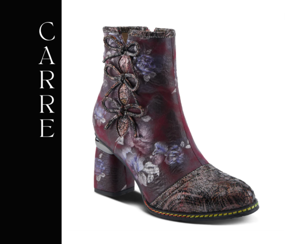 A close up of the side of a shoe with flowers
