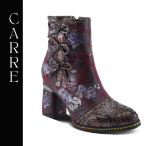 A close up of the side of a shoe with flowers